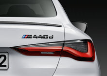 Modellschriftzüge und M Logo schwarz